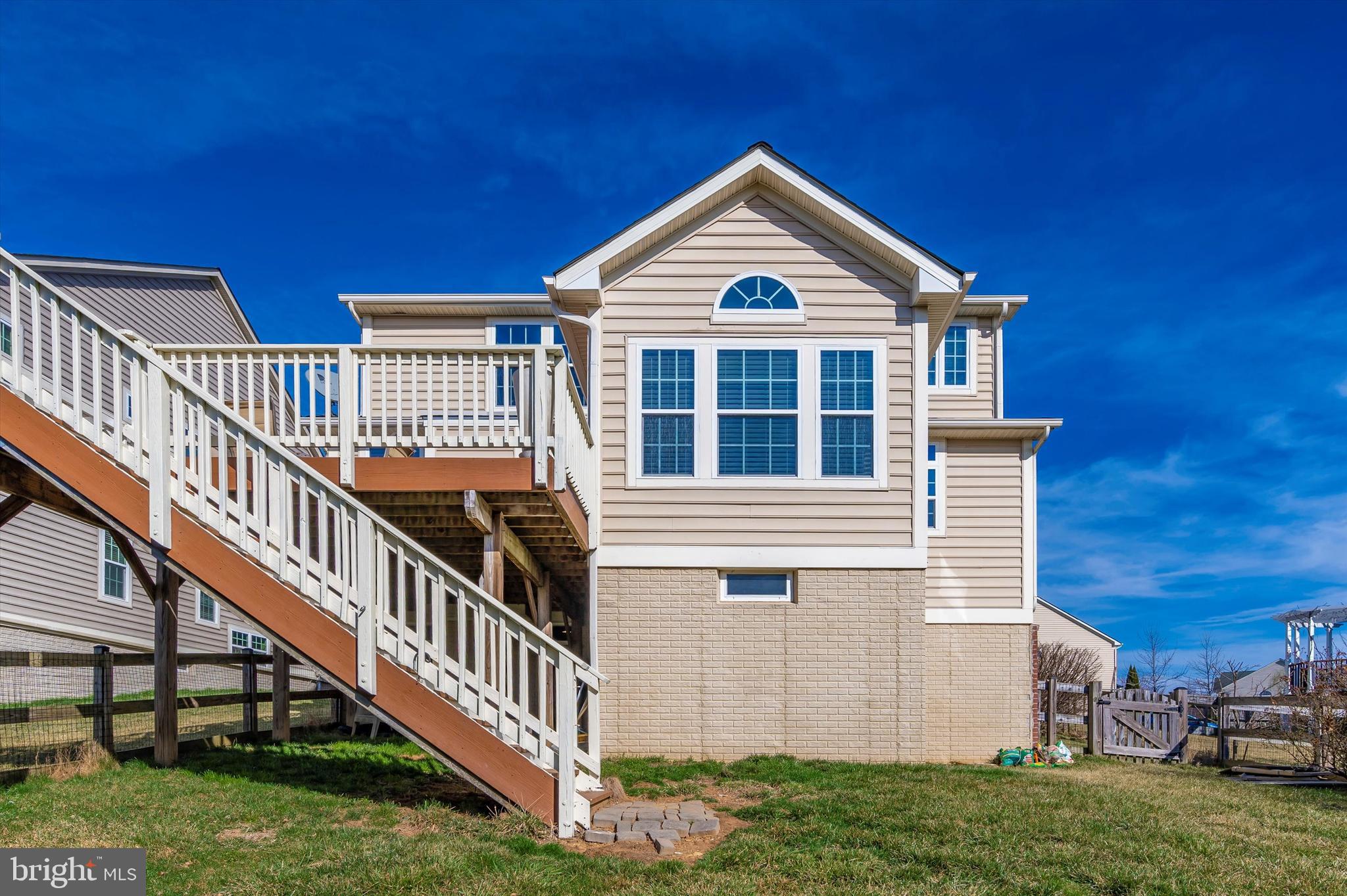 9121 Bealls Farm Road Frederick, MD 21704 - Photo 39 of 63 a view of a house with a yard
