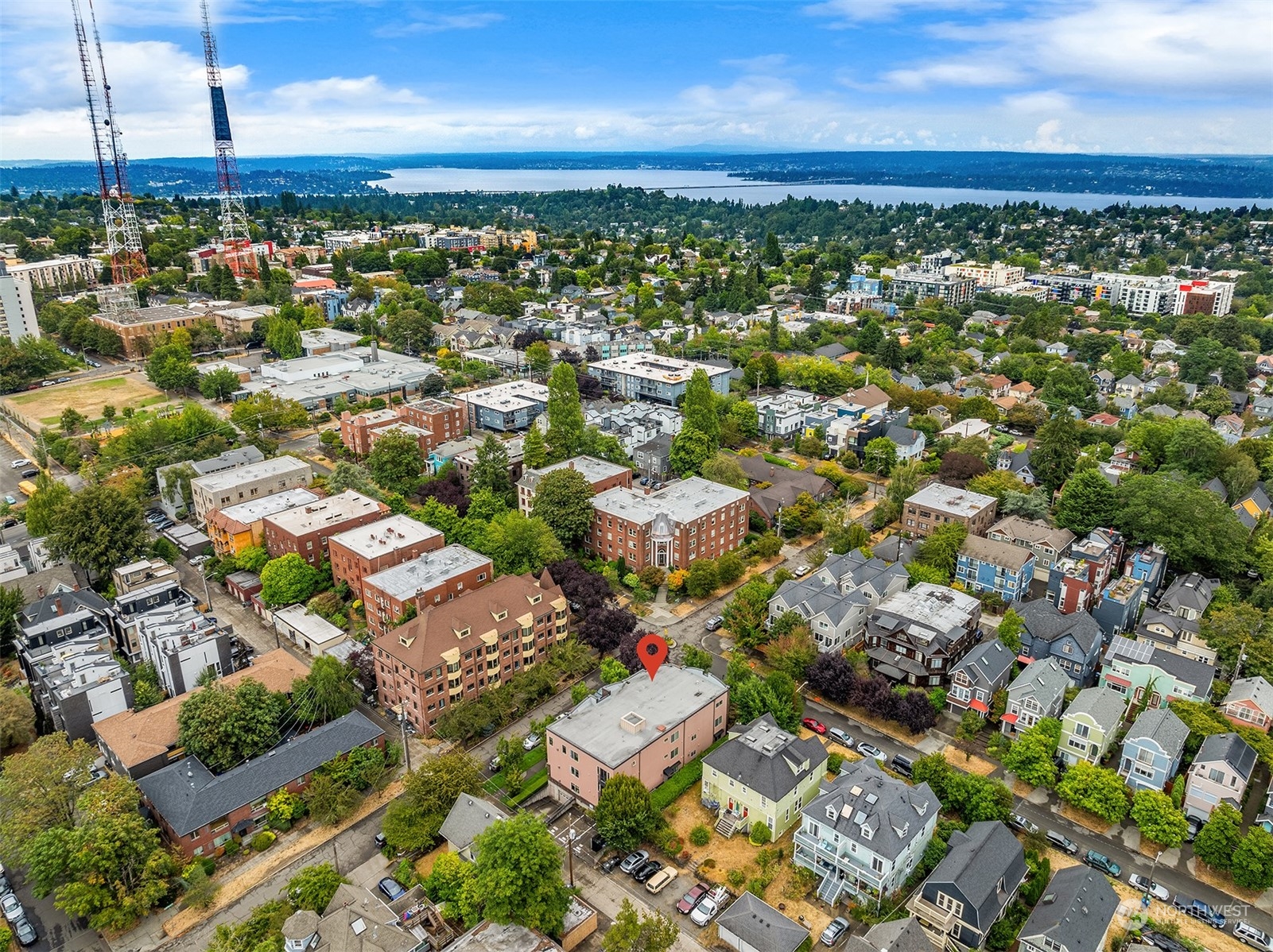 1621 East Spring Street, Unit 1B Seattle, WA 98122 - Photo 23 of 25 an aerial view of residential houses with outdoor space