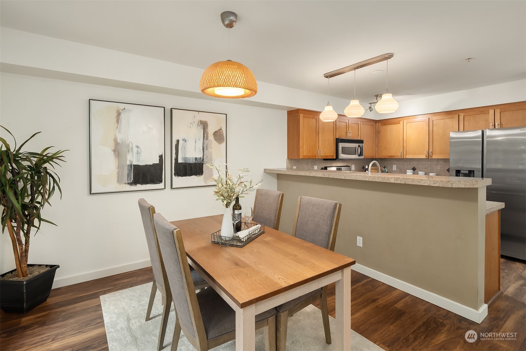 1621 East Spring Street, Unit 1B Seattle, WA 98122 - Photo 9 of 25 a kitchen with a table and chairs in it