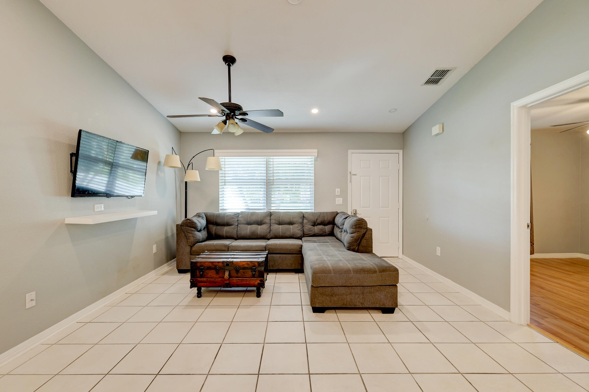 901 Southwest Fenway Road Port St. Lucie, FL 34953 - Photo 7 of 48 Living Area/Front Door