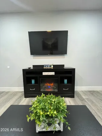 a living room with a flat screen tv