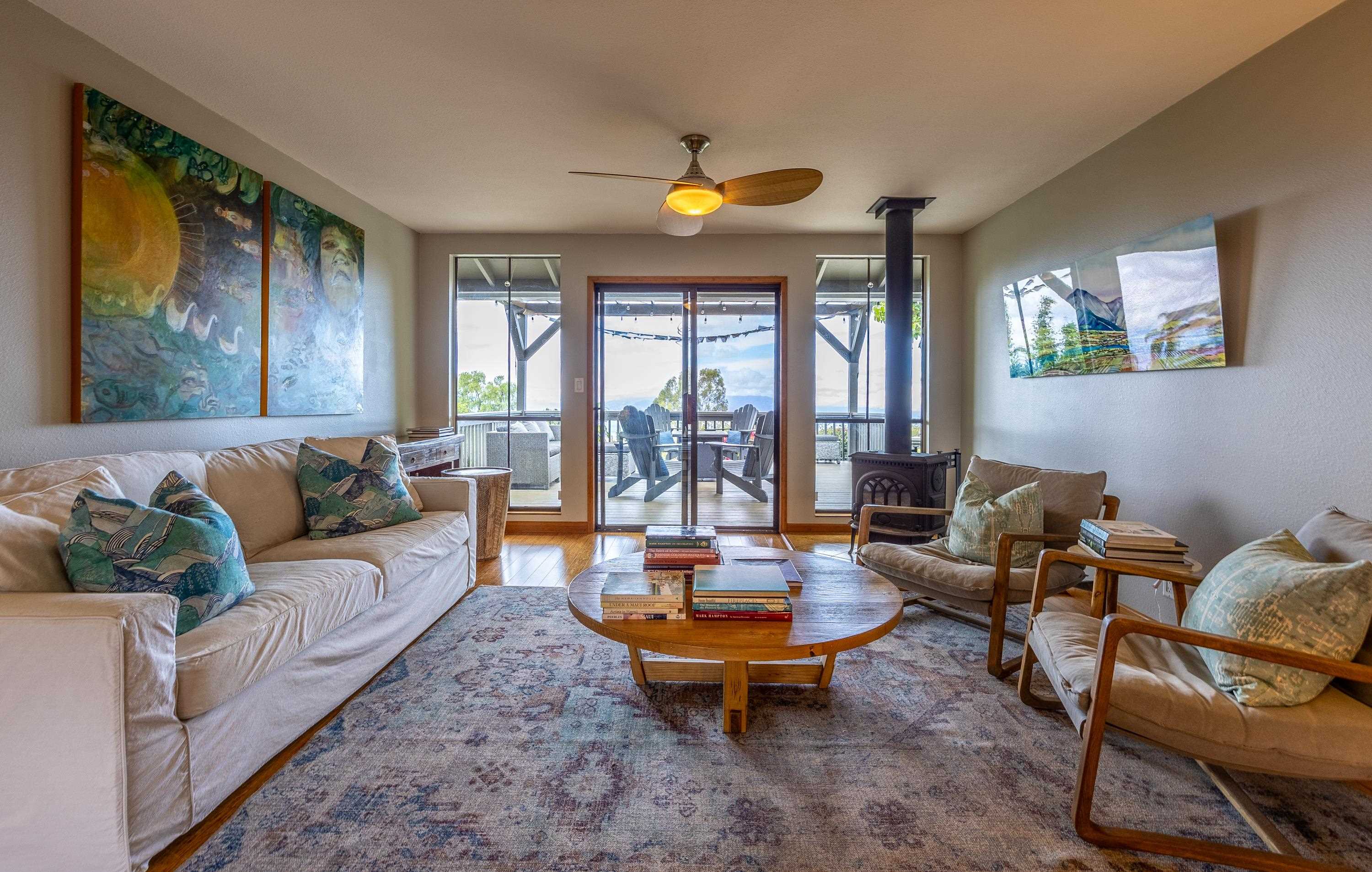 307 Ainakula Road Kula, HI 96790 - Photo 7 of 50 a living room with furniture and a large window