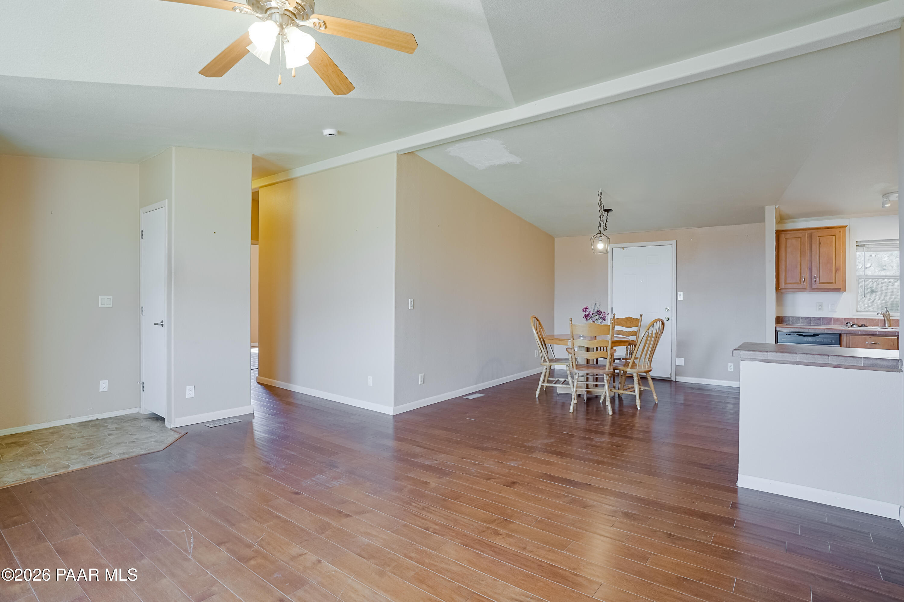 11800 Henderson Road Dewey-Humboldt, AZ 86327 - Photo 5 of 54 a view of a dining room with furniture and wooden floor