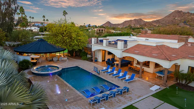 an aerial view of a chairs and table on the terrace