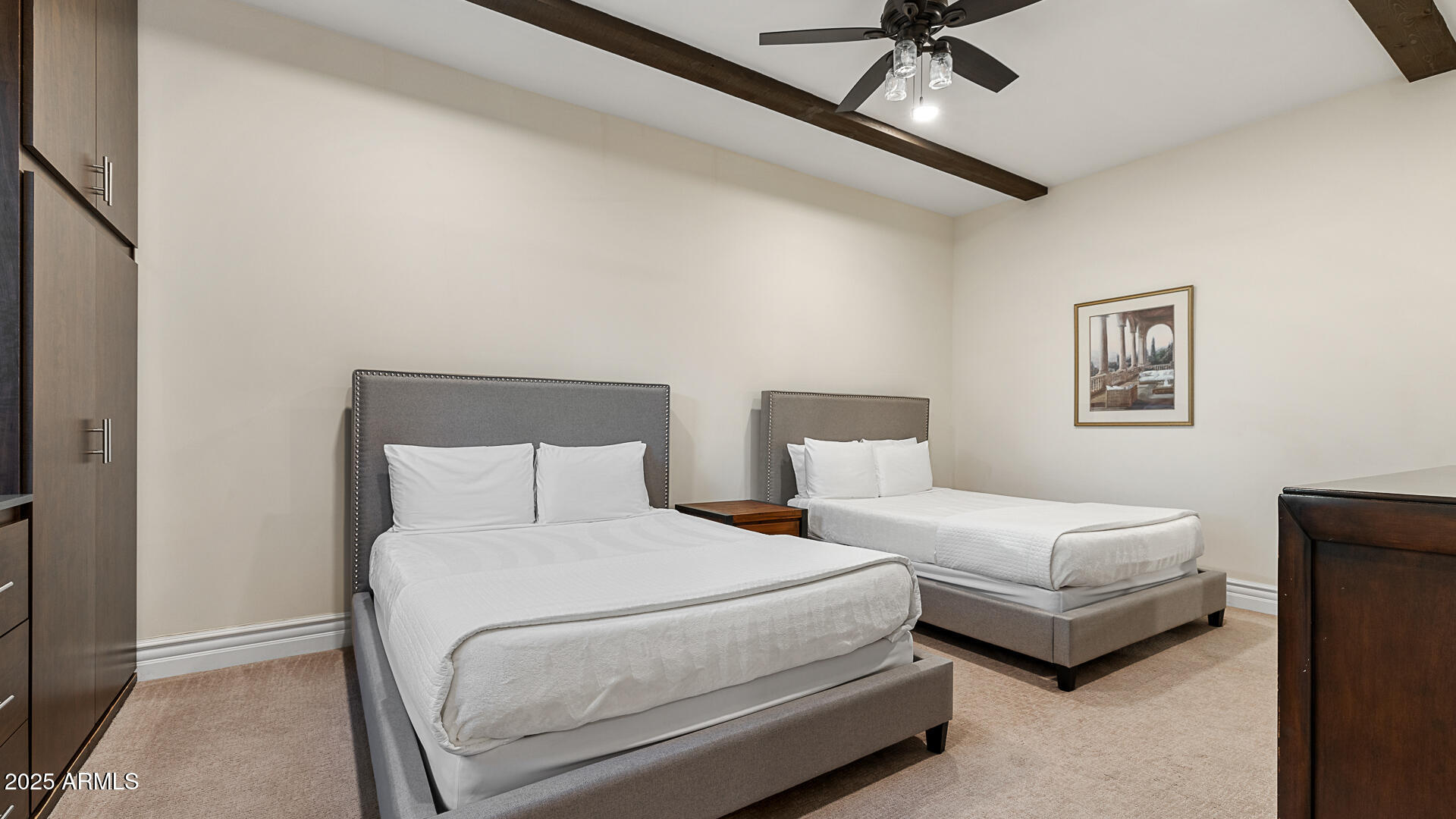 7120 North Quartz Mountain Road Paradise Valley, AZ 85253 - Photo 22 of 28 a bedroom with a bed couch and window