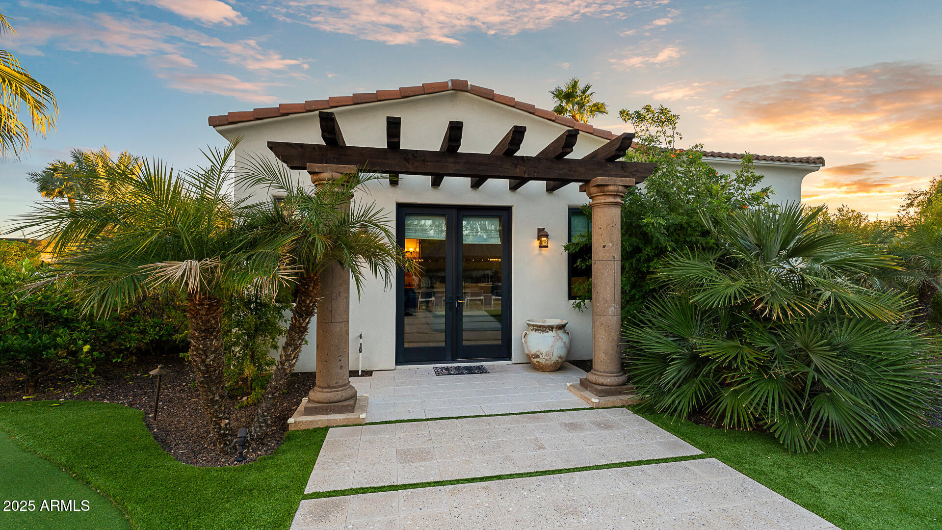 7120 North Quartz Mountain Road Paradise Valley, AZ 85253 - Photo 27 of 28 a front view of a house with garden