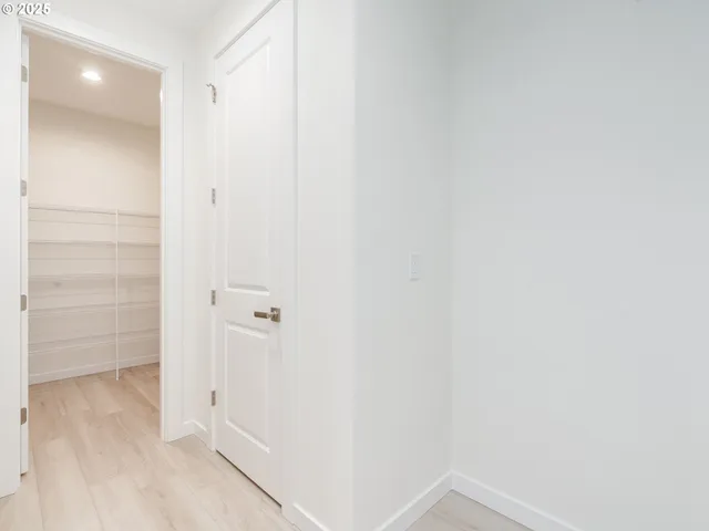 a view of a room with racks on the wall