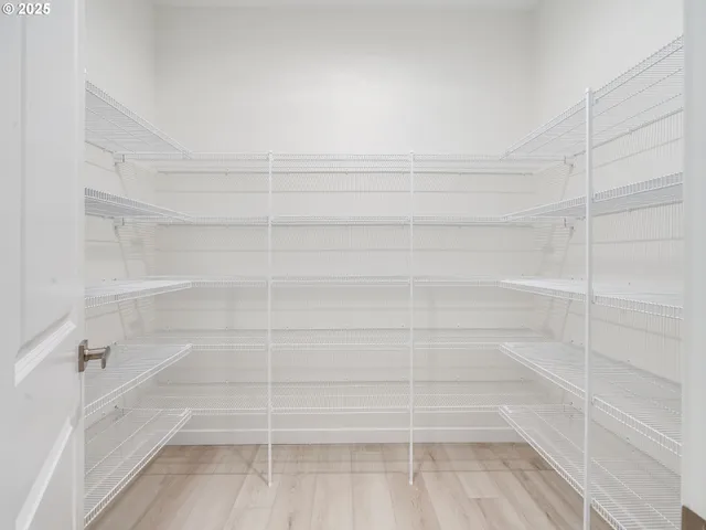 a view of a livingroom with wooden floor