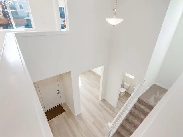 a view of empty room with windows