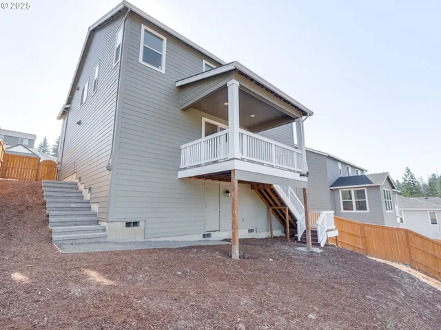 a view of a balcony with wooden floor