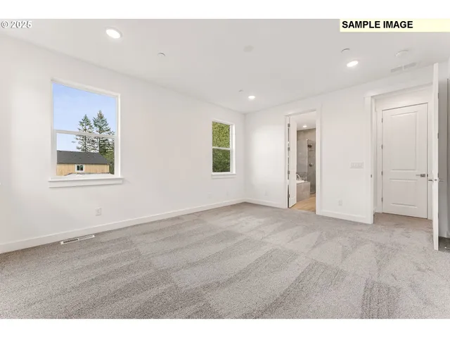 a bathroom with a sink a toilet and a shower