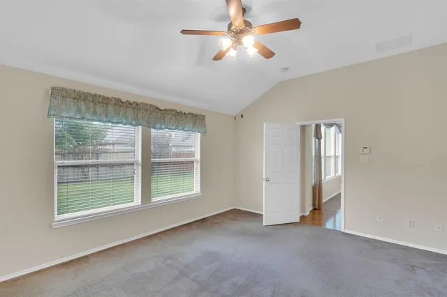 a bathroom with a sink double vanity and a mirror
