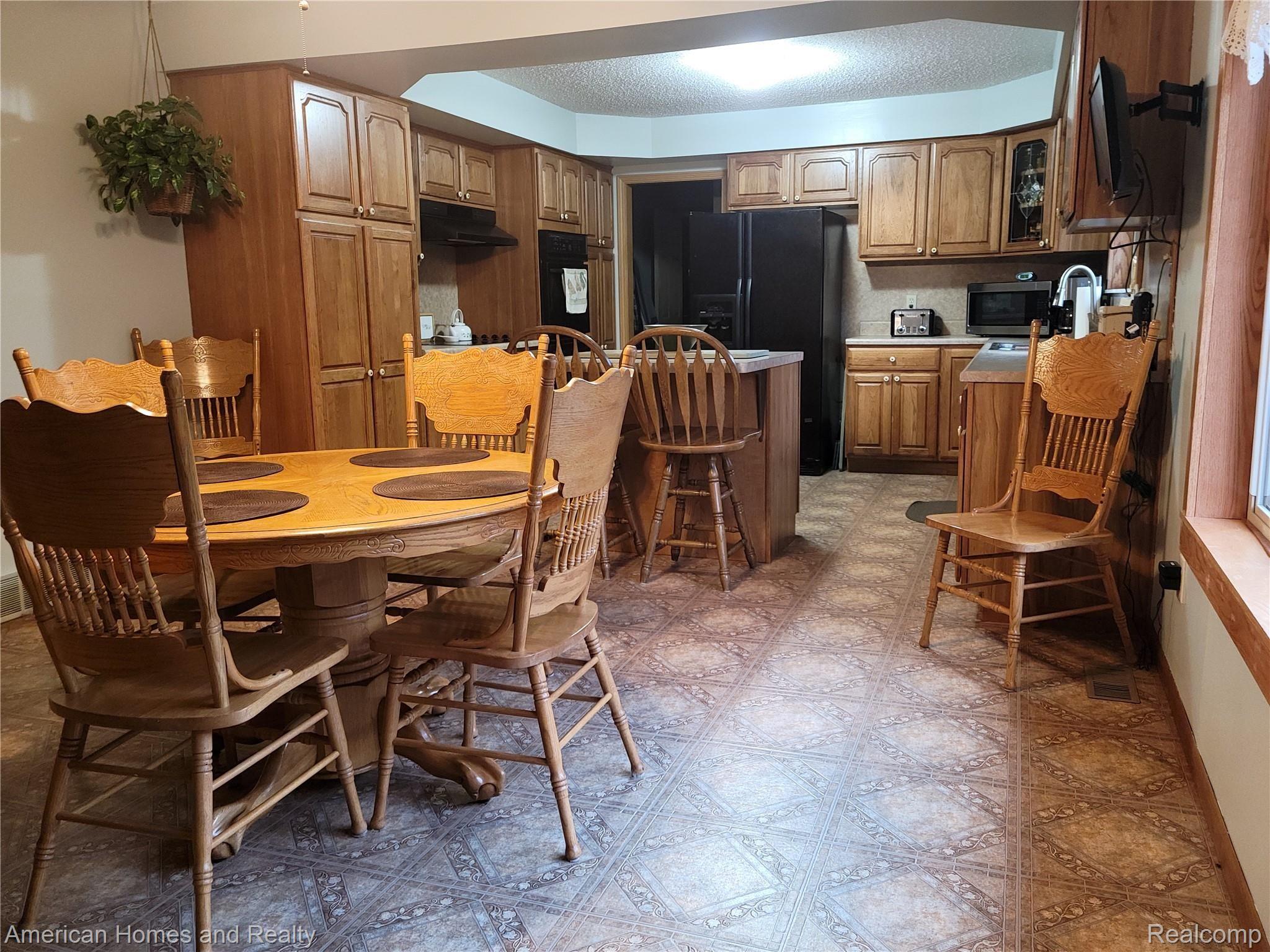 6530 Armstrong Road Imlay City, MI 48444 - Photo 15 of 59 Kitchen continuous with double oven and counter top stove
