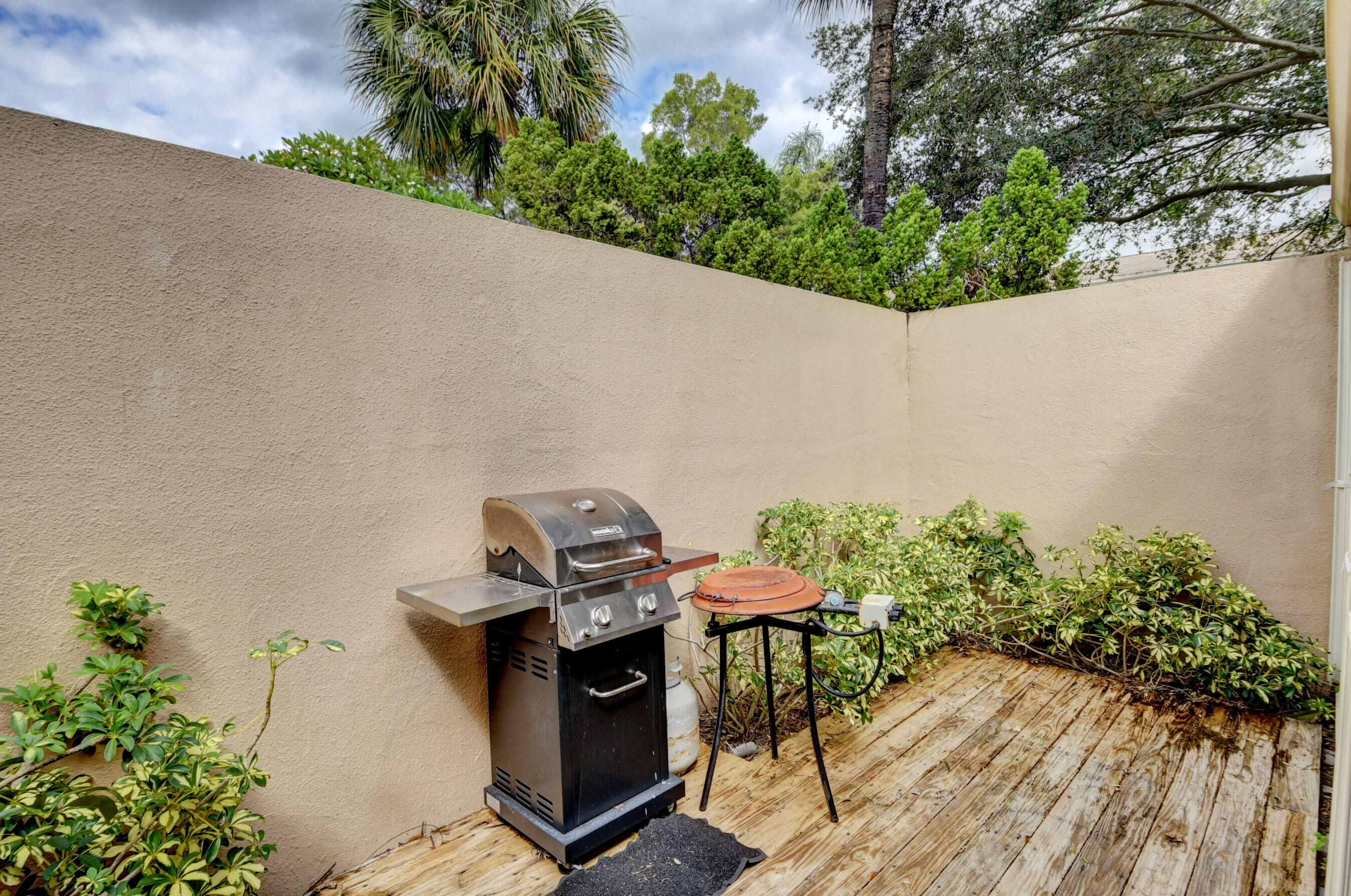 1141 Northwest 13th Street, Unit 1 Boca Raton, FL 33486 - Photo 16 of 28 Private Patio Ready for Entertaining
