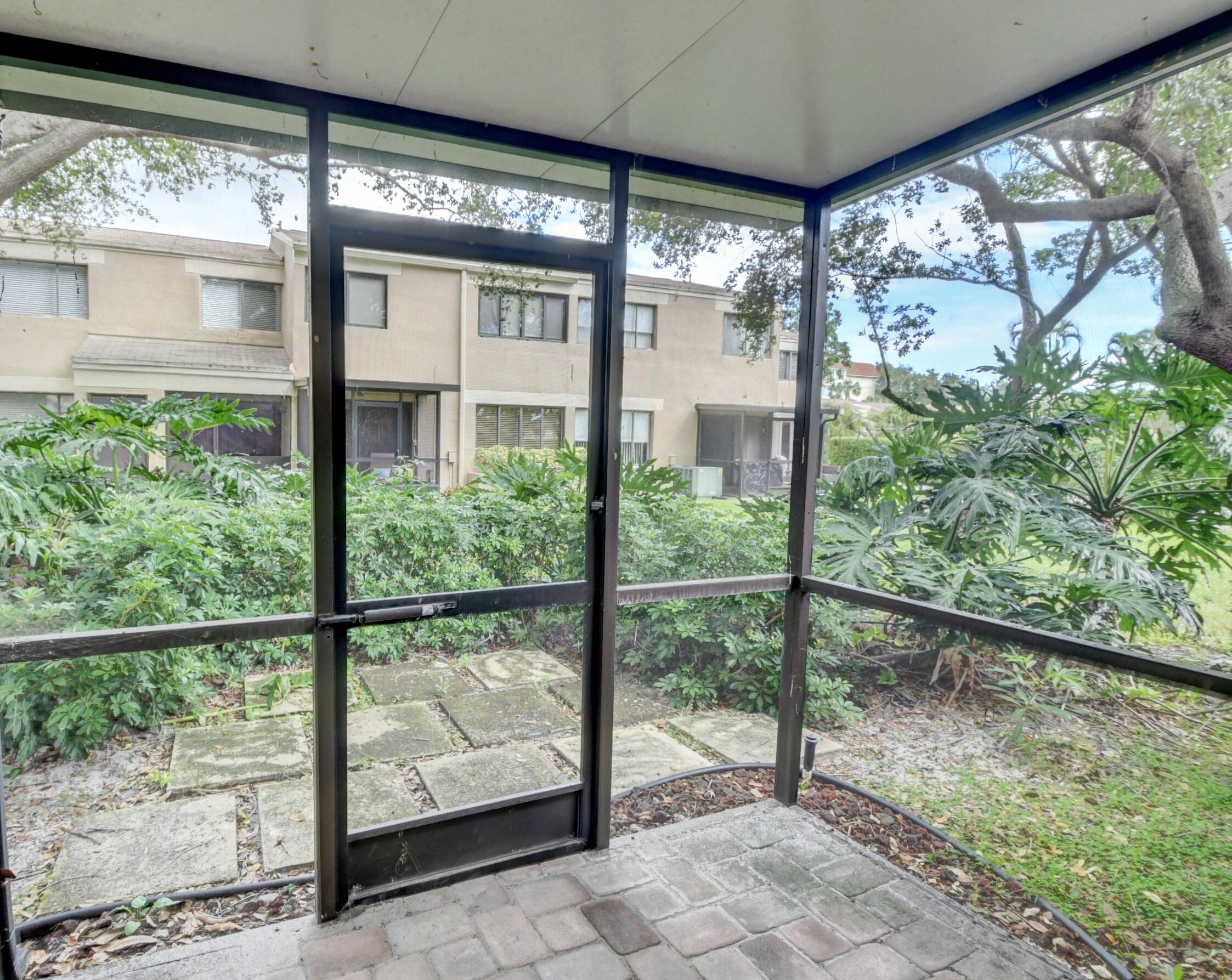1141 Northwest 13th Street, Unit 1 Boca Raton, FL 33486 - Photo 26 of 28 Screen Patio