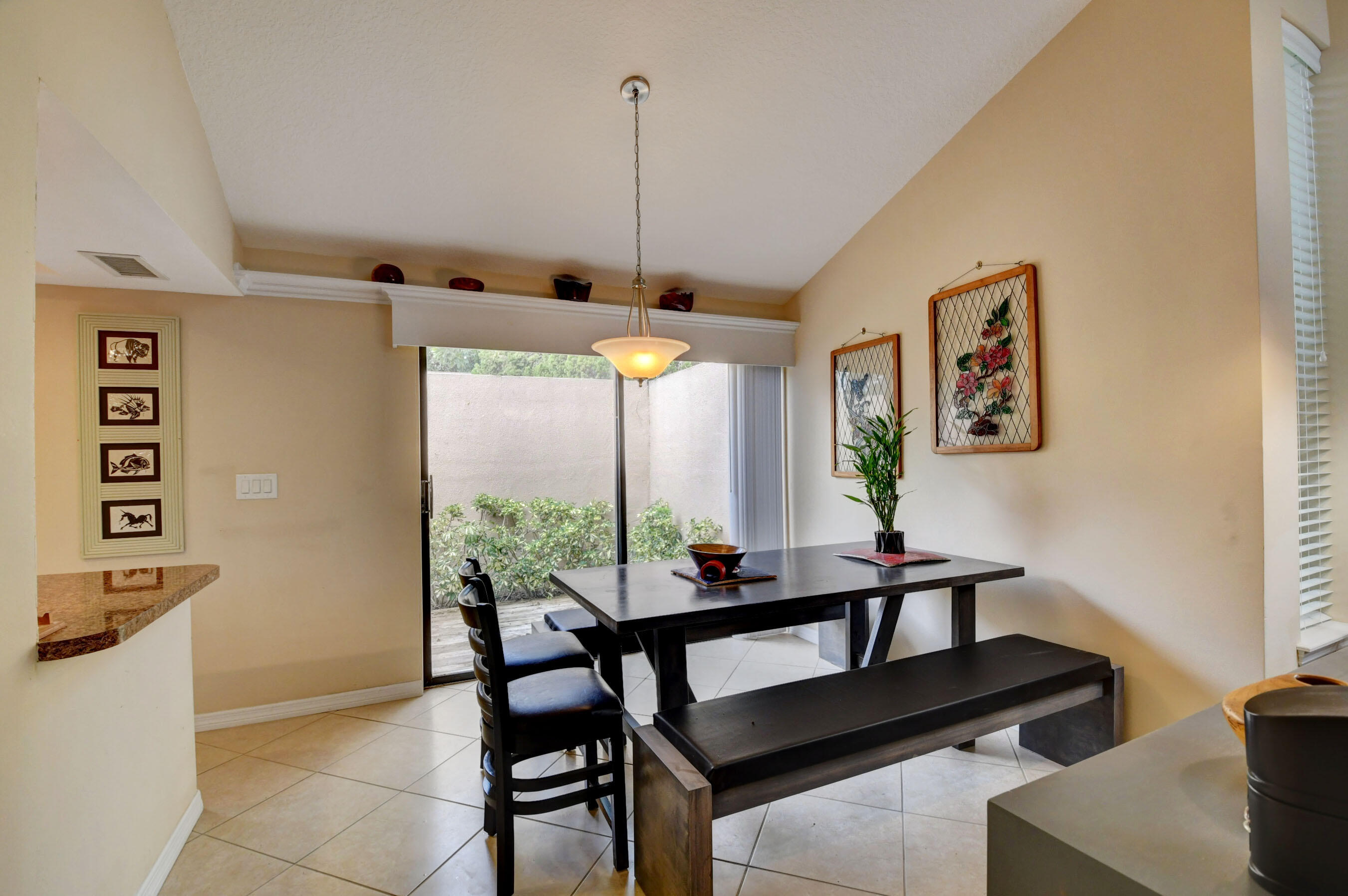 1141 Northwest 13th Street, Unit 1 Boca Raton, FL 33486 - Photo 6 of 28 Sliding Glass Door to Private Patio
