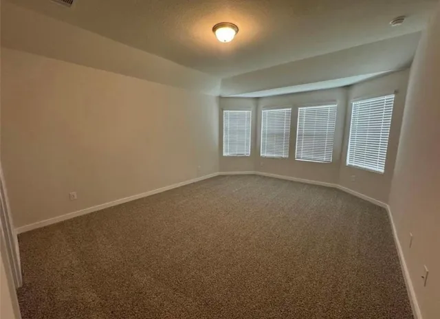 a bathroom with a sink double vanity and a mirror