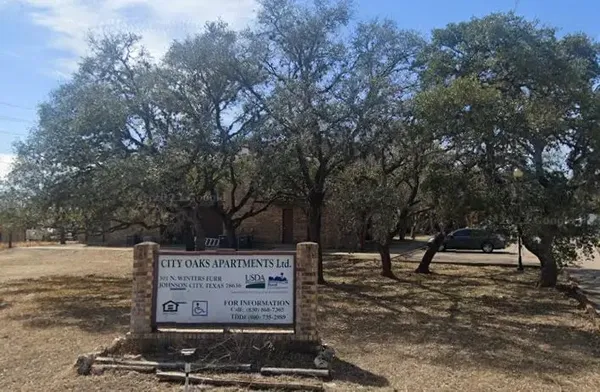 a view of a park with benches