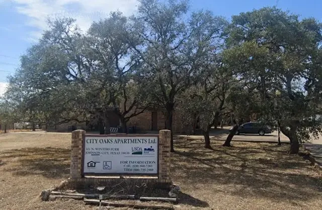 a view of a park with benches