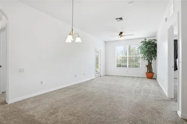a bathroom with a double vanity sink a mirror a bathtub and a shower