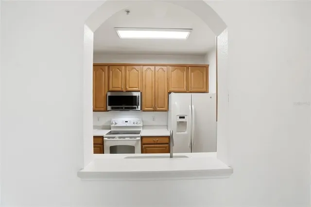 a bathroom with a shower a toilet and a shower