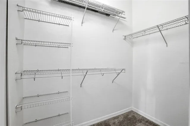 a living room with fireplace furniture and a wooden floor