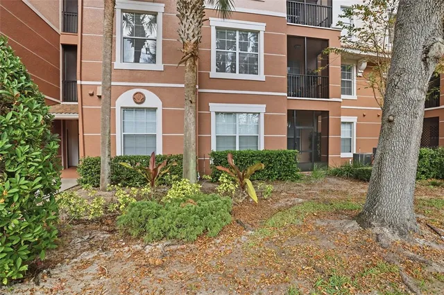 a view of a bedroom with a window and a gym machine