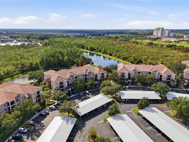 a view of a patio with a table and chairs