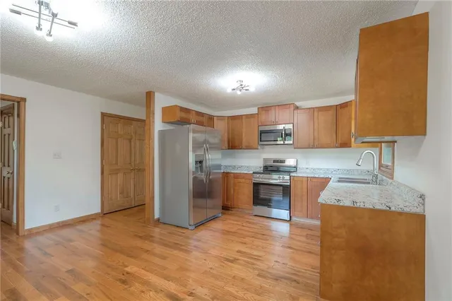 $349,000 | 313 Southwest Ensley Lane, Lee's Summit, MO 64081