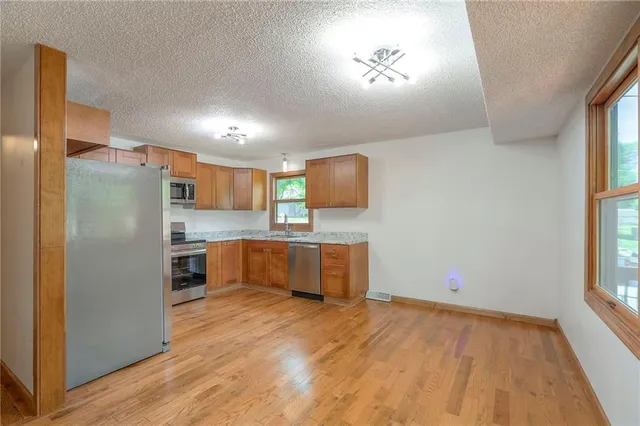 $349,000 | 313 Southwest Ensley Lane, Lee's Summit, MO 64081