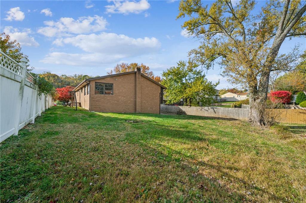 12219 Roth Drive Irwin, PA 15642 - Photo 47 of 48 a view of a backyard with a garden