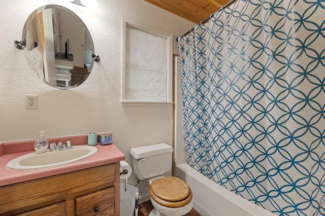 a bathroom with a sink and a toilet