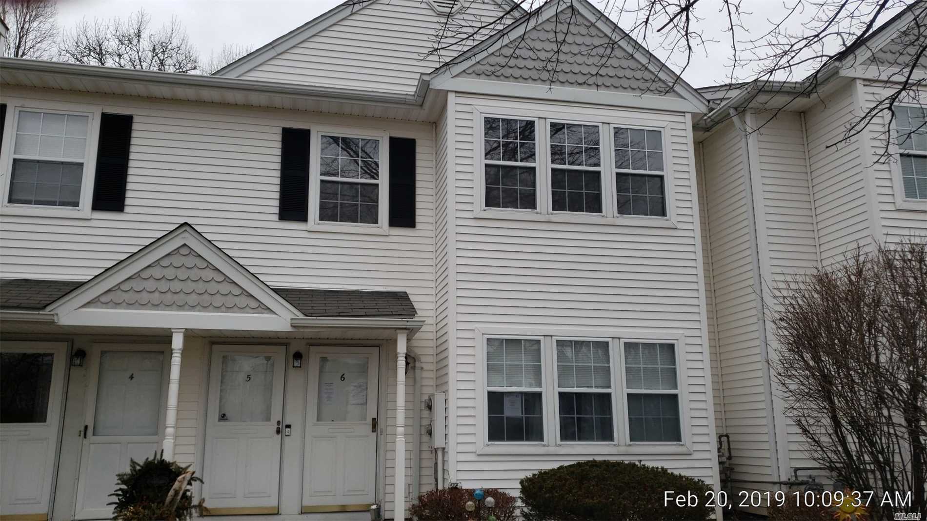 6 Country View Lane Middle Island, NY 11953 - Photo 1 of 1 a front view of a house