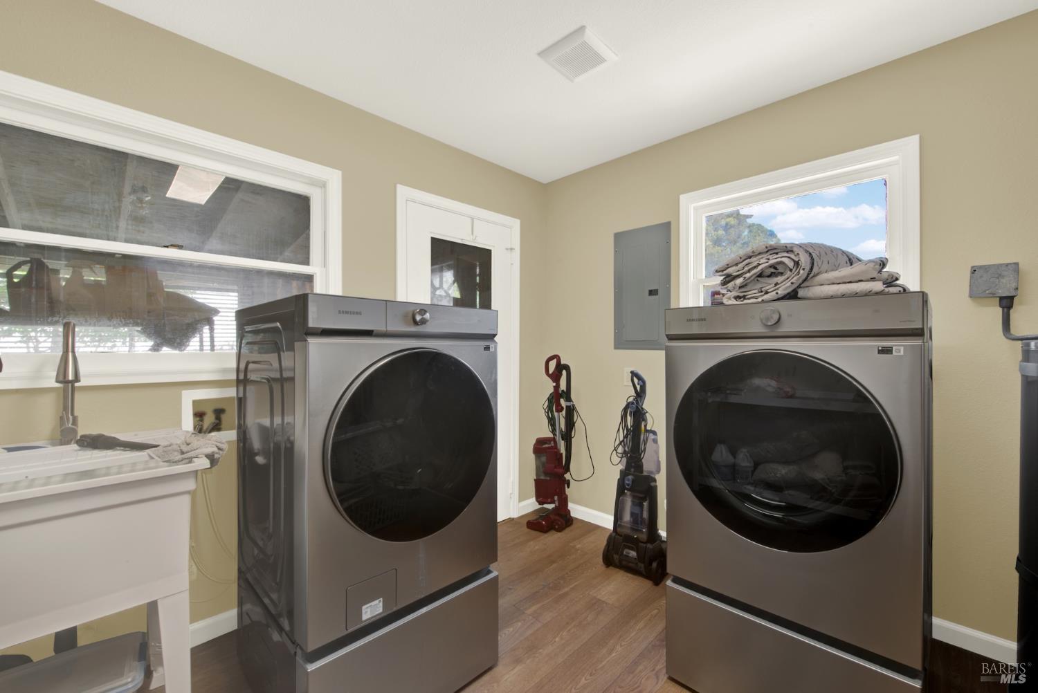 4851 Udell Road Vacaville, CA 95688 - Photo 28 of 65 a view of a hallway with washer and dryer