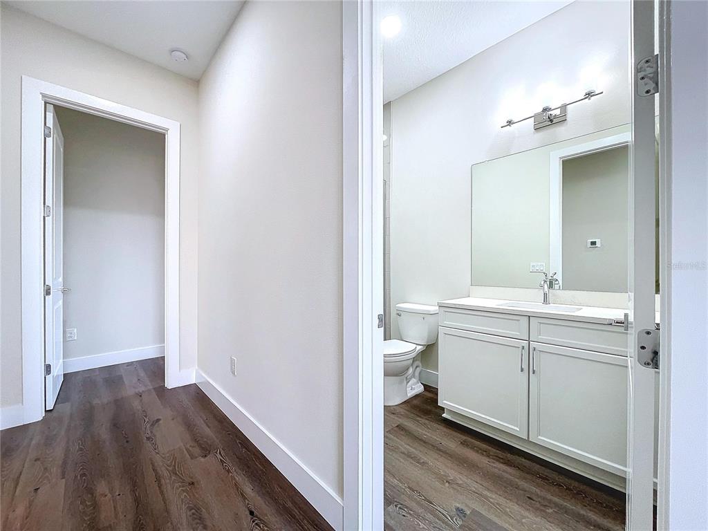 9065 Mississippi Run Weeki Wachee, FL 34613 - Photo 62 of 86 a bathroom with a sink and a mirror