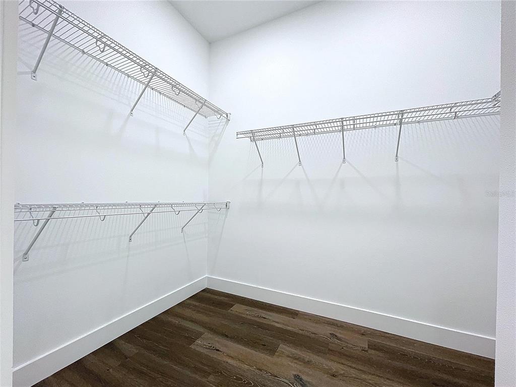9065 Mississippi Run Weeki Wachee, FL 34613 - Photo 71 of 86 a view of an empty walk in closet