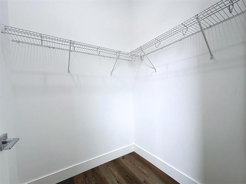 9065 Mississippi Run Weeki Wachee, FL 34613 - Photo 79 of 86 a view of a room with racks on the wall