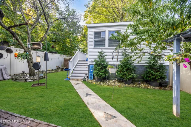 a house view with a garden space