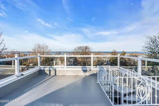 a view of a balcony with city view