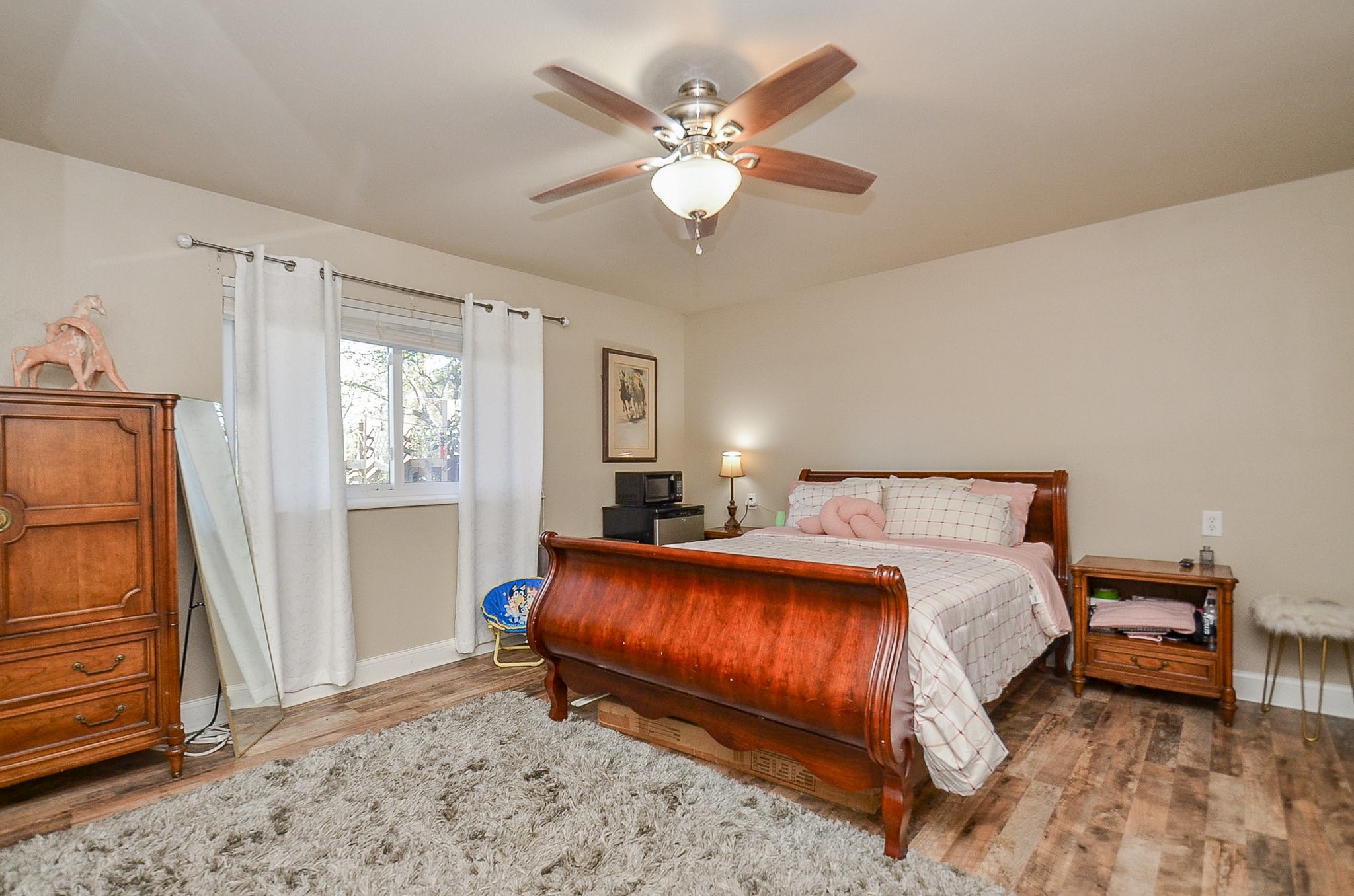 720 Surrey Drive Simonton, TX 77485 - Photo 16 of 34 a bedroom with a bed and a window
