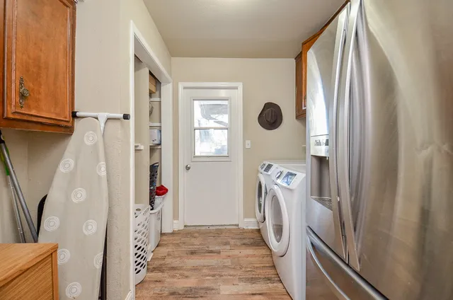 a view of a bathroom with sink and mirror