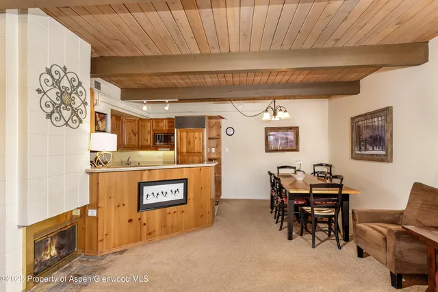 a view of a room with furniture and window