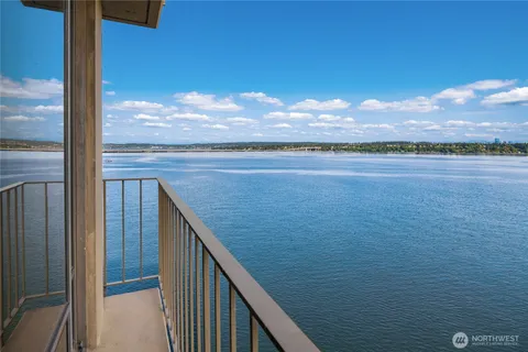 a view of balcony with furniture