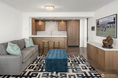a bathroom with a black and white checkered floor