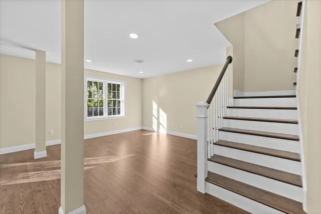 a view of entryway with wooden floor