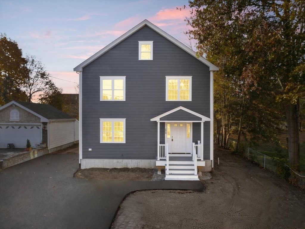 271 Ames Street Brockton, MA 02302 - Photo 2 of 40 a front view of a house with a yard