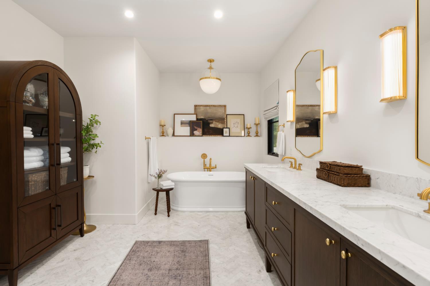 7697 Horseshoe Bar Road Loomis, CA 95650 - Photo 26 of 76 a spacious bathroom with a double vanity sink and a mirror