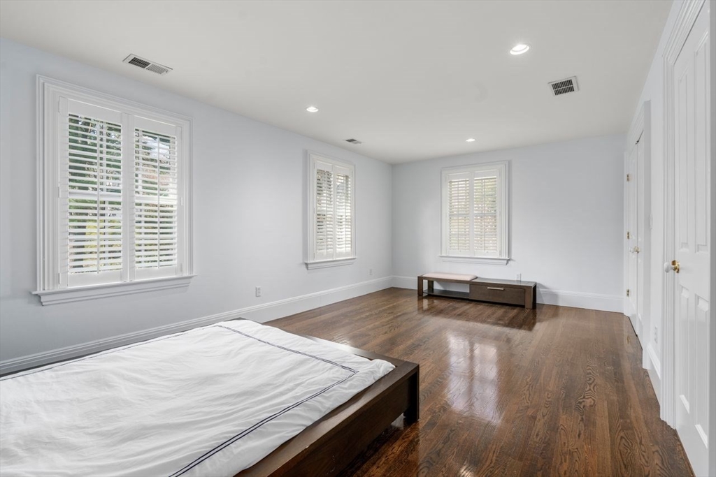 22 Plymouth Road Wellesley, MA 02481 - Photo 30 of 37 a view of a room with wooden floor and furniture