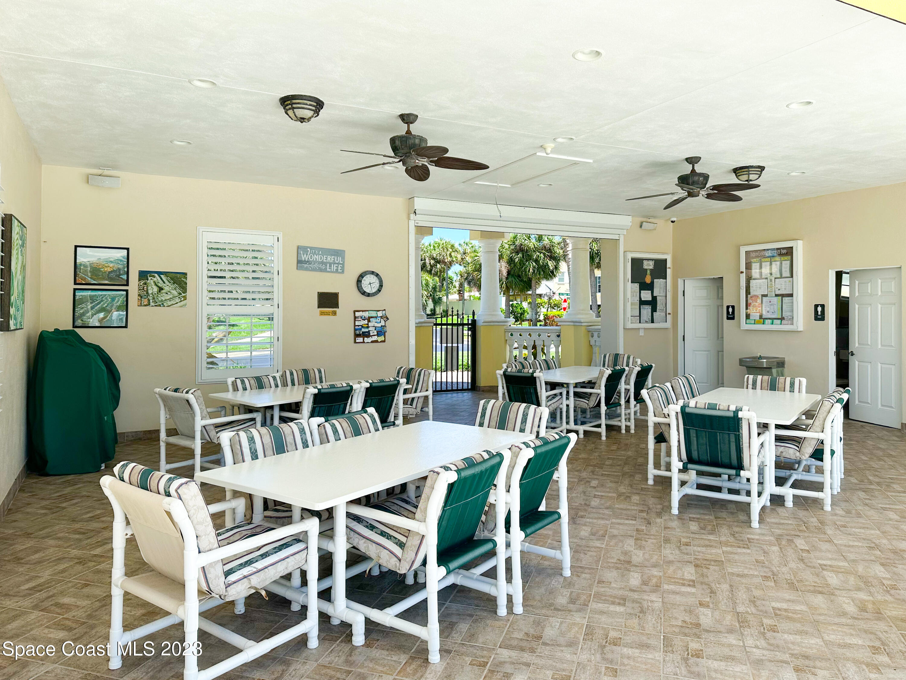 245 Clyde Street Melbourne Beach, FL 32951 - Photo 79 of 88 a view of a dining room with furniture window and outside view