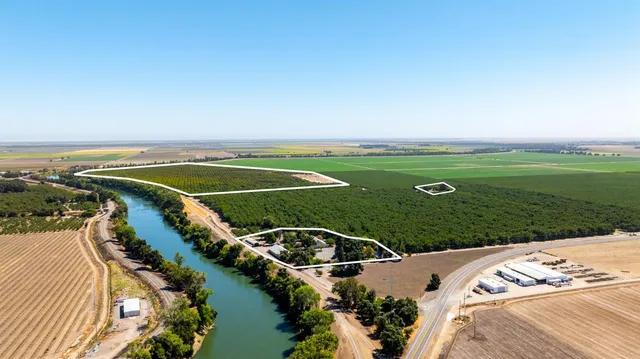 a view of a field with clear sky